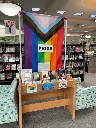 Residents Flood Library With New Copies of LGBTQ Books Stolen by Anti-Pride Protestors