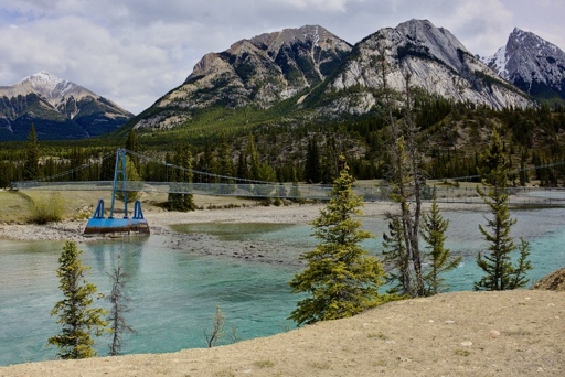 The pedestrian bridge spanning across the North Saskatchwan River.  From left I believe you have Leporidae Peak follwed by Normandy, Ardennes, and Elbe peaks all in the same cluster.